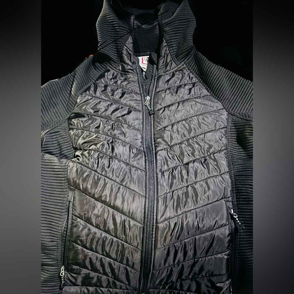 Avalanche Women’s Puffer Jacket With Nylon Fabric On The Upper and Arms.